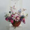 Mẫu Giỏ Mây Tulip Tím Phối Lan và Phi Yến thiết kế lãng mạn tại Mcheng Florist Long Khánh