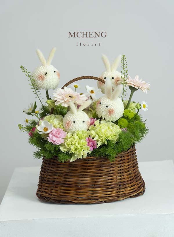 Gio May Ping Pong Bon Chu Tho Mcheng Florist Long Khanh Mẫu Giỏ Mây Ping Pong Bốn Chú Thỏ thiết kế giỏ tre đan mộc mạc tại shop hoa tươi Mcheng Florist