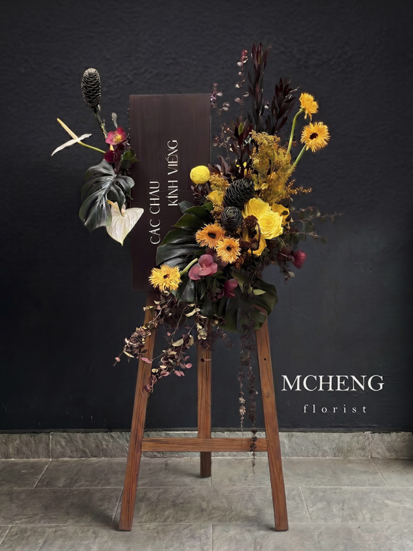 Kệ Hoa Chúc Mừng Vàng Đen Khẳng Định Vị Thế - Mcheng Florist Mẫu Kệ Hoa Chúc Mừng Tone Vàng Đen thiết kế nghệ thuật cá tính tại Mcheng Florist